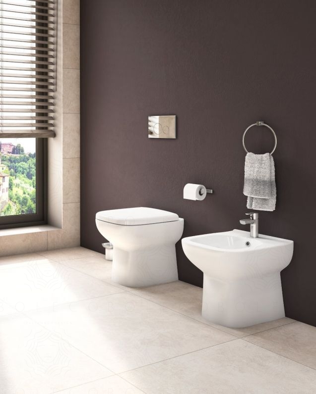 Coppia di sanitari filomuro in ceramica Origin con sedile Coppia di sanitari filomuro in ceramica Origin con sedile
