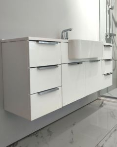 Mobile bagno sospeso Kelly 130 cm bianco lucido con ante e cassetti e lavabo in resina