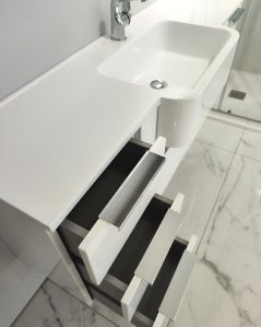 Mobile bagno sospeso Kelly 130 cm bianco lucido con ante e cassetti e lavabo in resina