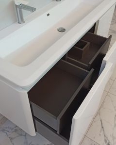 Mobile bagno sospeso 140 cm con cassetti e lavabo in resina -